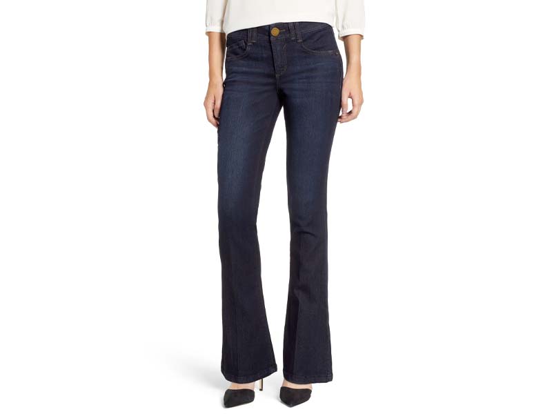 Wit & Wisdom WIT & WISDOM 'Ab'Solution Itty Bitty Bootcut Jeans, Alternate, color, INDIGO 'Ab'Solution Itty Bitty Bootcut Jeans, sales video thumbnail WIT & WISDOM 'Ab'Solution Itty Bitty Bootcut Jeans, Alternate, color, INDIGO WIT & WISDOM 'Ab'Solution Itty Bitty Bootcut Jeans, Alternate, color, INDIGO WIT & WISDOM 'Ab'Solution Itty Bitty Bootcut Jeans, Alternate, color, INDIGO WIT & WISDOM 'Ab'Solution Itty Bitty Bootcut Jeans, Alternate, color, INDIGO Show less SIZE INFO Runs large; order one size down. Mid rise. DETAILS & CARE Stretch jeans in a polished dark wash get a lean and leggy look from a slim cut balanced with a narrow boot-leg opening. The 'Ab'solution construction flatters with power-mesh panels to mold and hold, including a waistband with interior control and booty-lift construction. 32" inseam; 16 1/2" leg opening; 9 3/4" front rise; 14" back rise (size 8) 32" inseam; 21" leg opening; 11" front rise; 16" back rise (size 18) Zip fly with button closure Five-pocket style Dark dye may transfer to lighter materials 54% cotton, 27% rayon, 17% polyester, 2% spandex Machine wash, tumble dry Imported Point of View and Petite Focus Item #5625056 Helpful info: Fit guides See details and tips from a salesperson (video) Petite sizes best fit women 5'4" & under. Free Shipping & Returns See more GIFT OPTIONS Choose your gift options at Checkout. Some items may not be eligible for all gift options. Free Pickup Printed gift message (free) Nordstrom gift box (free) Fabric gift bag ($5) Signature gift wrap ($5) Delivery Email gift message (free) Printed gift message (free) Fabric gift bag ($5) DIY Nordstrom gift box ($5) Need help finding the perfect gift? We've got you covered. Shop Gifts WIT & WISDOM Wit & Wisdom offers a beautiful lineup of casually chic tops and pants in a full range of sizes from petite to plus. The brand specializes in laid-back looks that are consistently clean, classic and pulled together. Women with all body types seek out Wit & Wisdom clothing, particularly the brand's famous "Ab-solution" jeans, which offer slimming, shaping and lifting in all the right places. (340) 'Ab'Solution Itty Bitty Bootcut Jeans